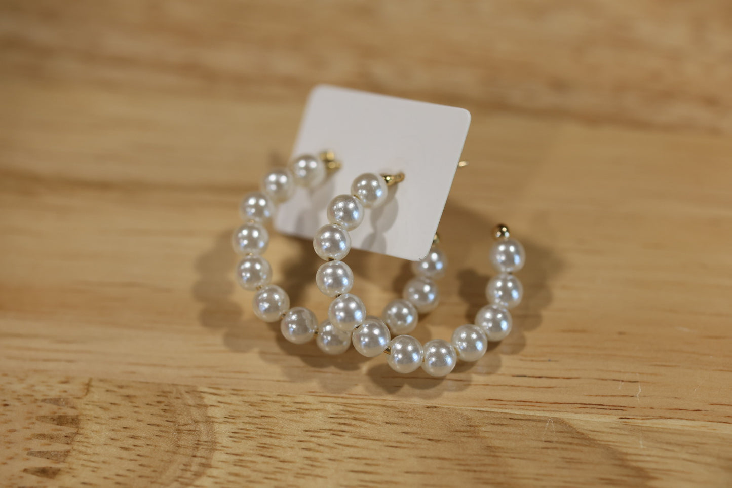 Pearl half hoop earrings